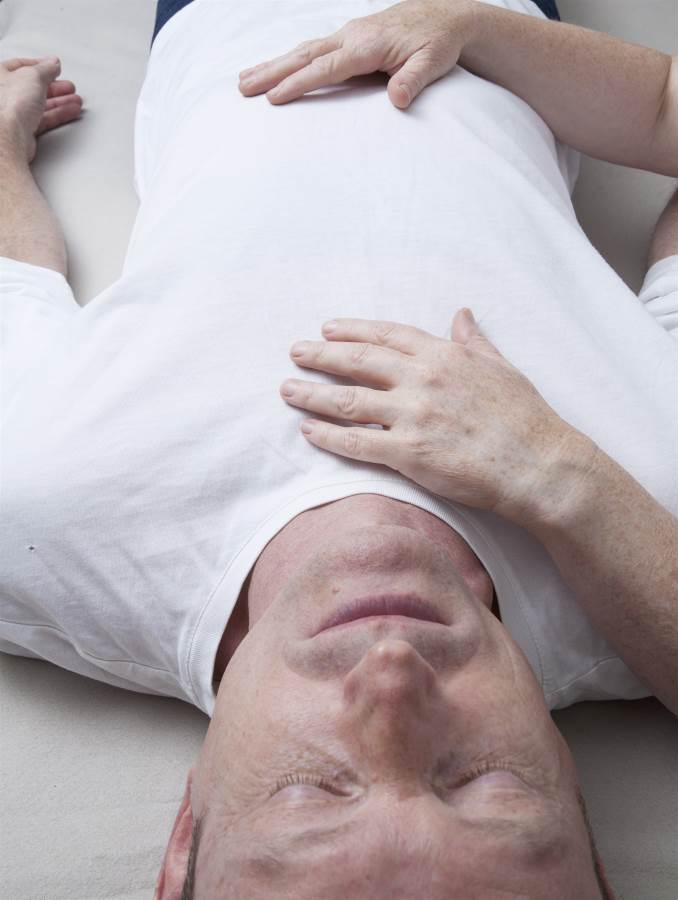 man having craniosacral treatment